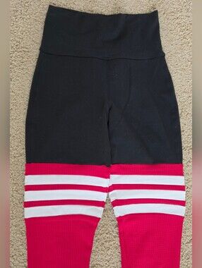 Bombshell Sportswear Black Leggings with Red and White Stripe Panels